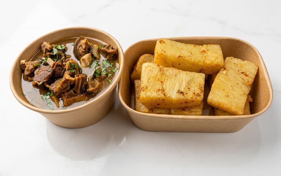 Pepper soup and boiled yam in kraft takeaway containers